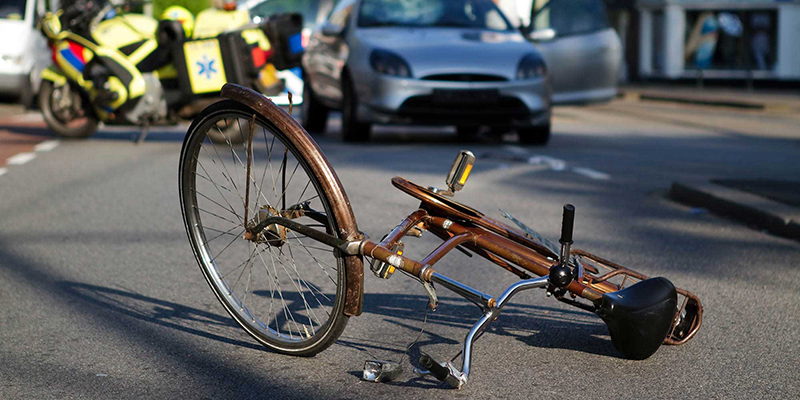 broken bicycle on street